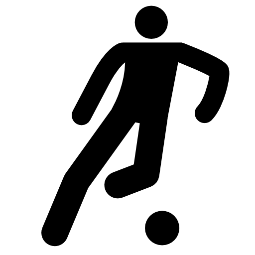 Football player kicking ball