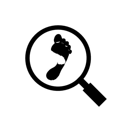 Magnifying lens on a human footprint